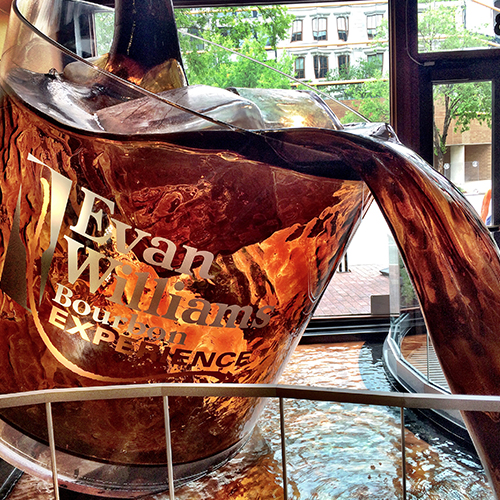 Evan Williams bourbon glass display